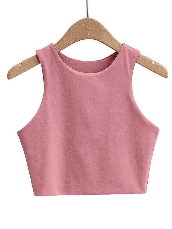 Pink women's seamless cropped workout top hanging on a wooden hanger, perfect for fitness and comfort, SF0026.